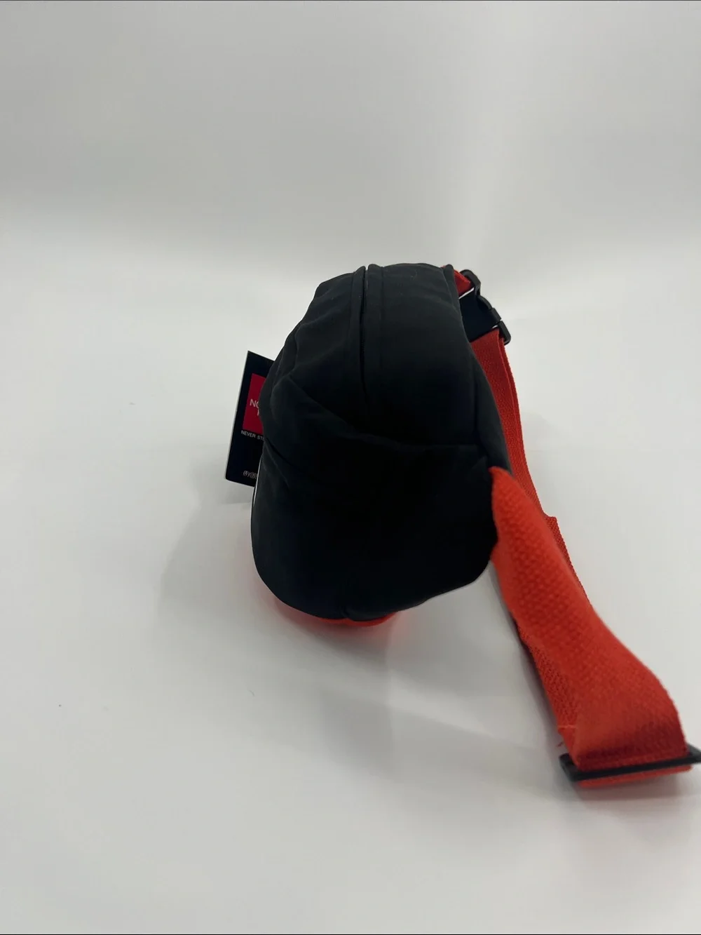 The North Face Black Belt Bag with Red Strap for Men & Women